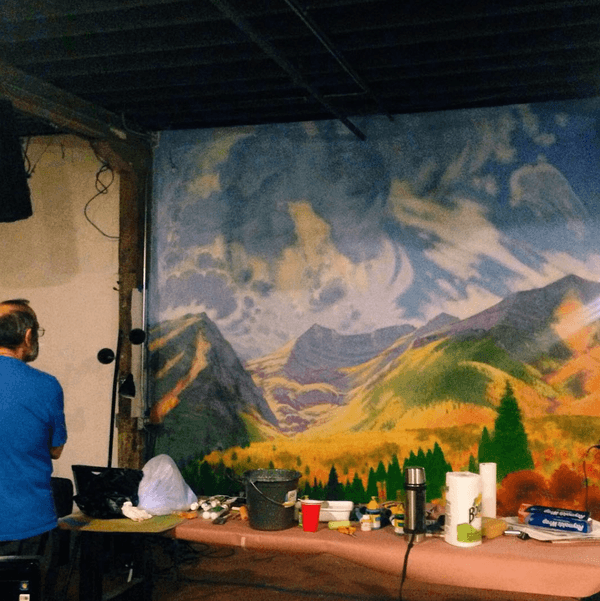 Painting a mountain mural